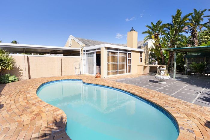 Blouberg House For Sale: Enclosed braai room, heated pool, approved flatlet plans.