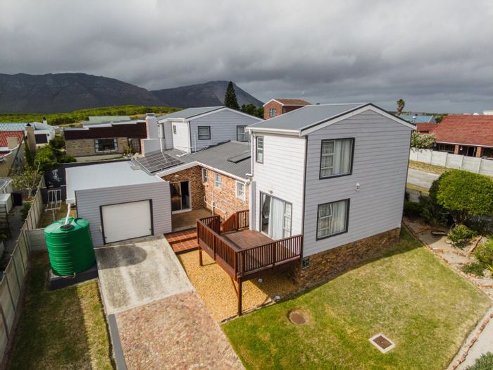 De Kelders House For Sale: Two units, sea views, solar energy, outdoor space.