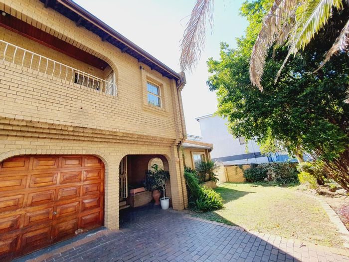 Spacious 6-bedroom house with pool, garage, and business potential in Marlboro Gardens. For Sale.