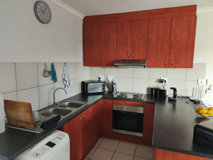 2-Bedroom Apartment To Rent in Kraaifontein Central with balcony and secure estate access.