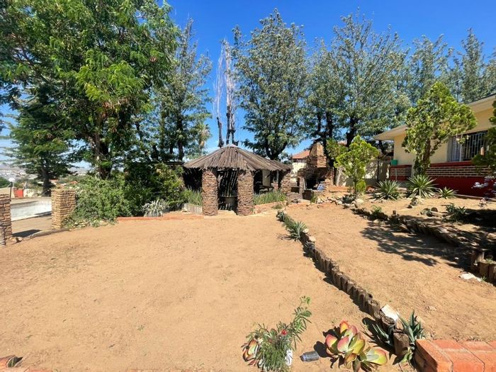 For Sale: Spacious 4-bedroom house in Windhoek West with pool and development potential.