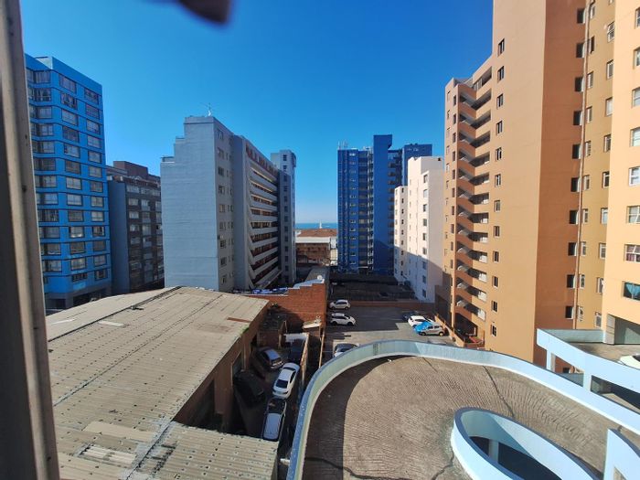 South Beach Apartment For Sale: Open plan living, sea views, secure building access.