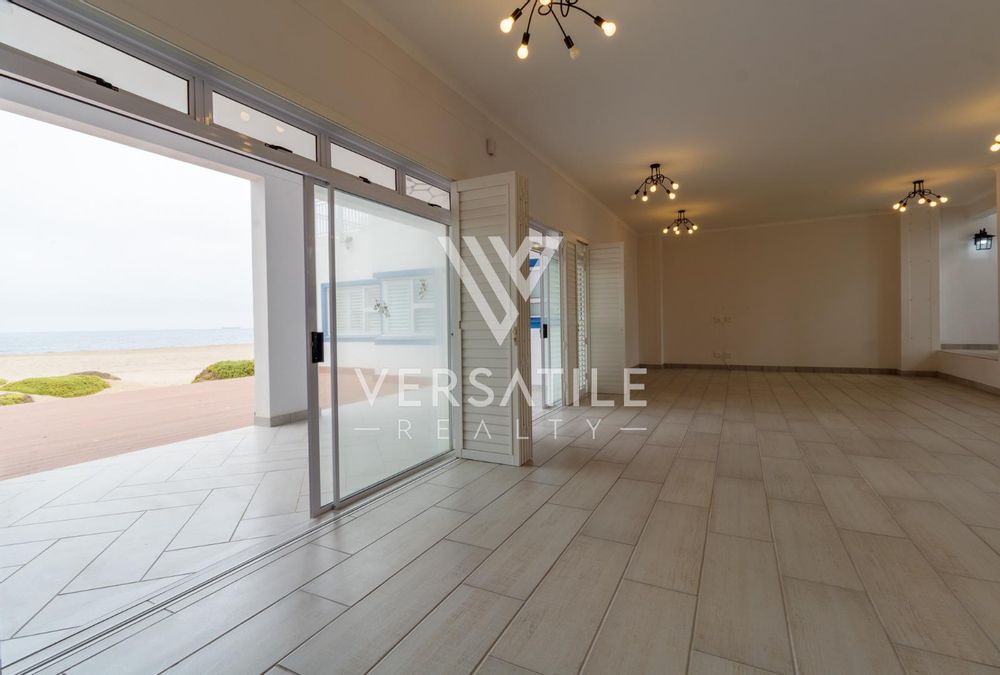 Beach view from open plan lounge and dining area