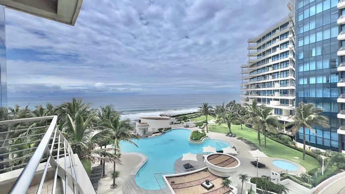 Umhlanga Rocks Central Apartment To Rent: 2 beds, sea views, pool access, secure parking.