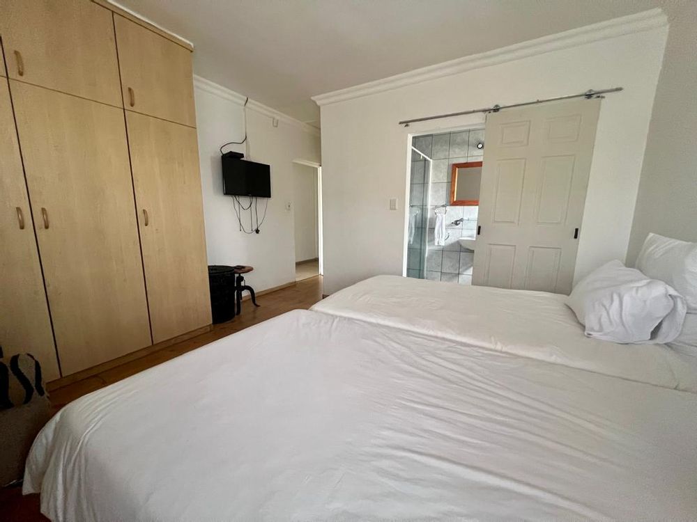 Bedroom 2 with BIC and sliding door to bathroom