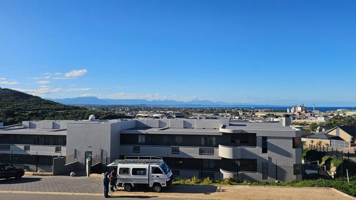 Island View Apartment For Sale: 2 Bedrooms, panoramic views, secure parking, open-plan living.
