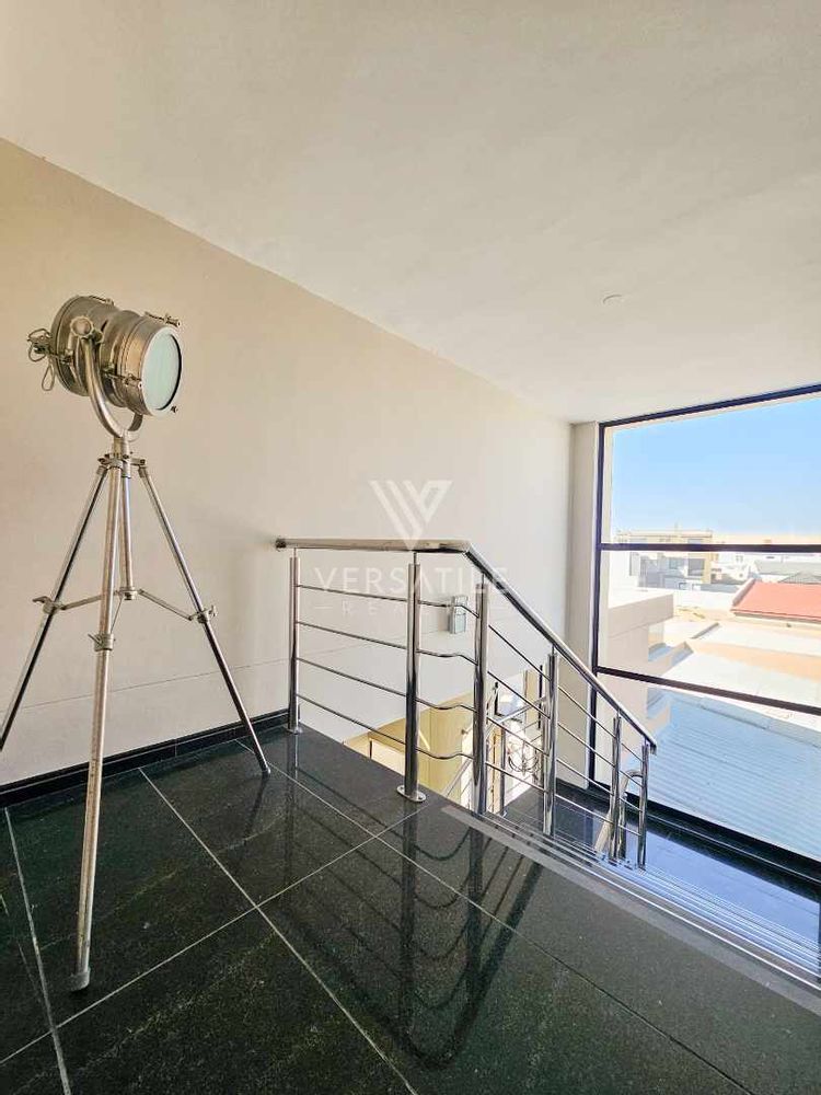 76 - Stair case to top floor with desert views 