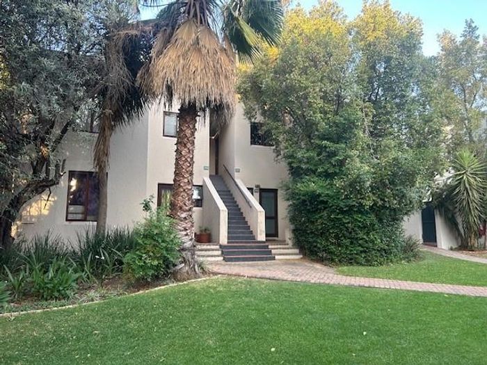 For Sale: Apartment in Jukskei Park with pool, gardens, and two parking bays.