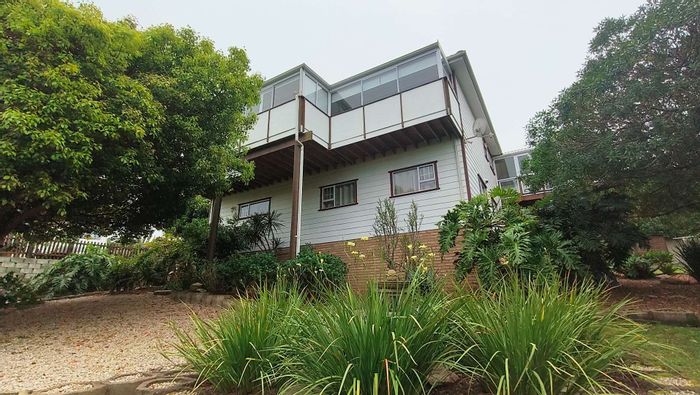 For Sale: Unique Dana Bay house with ocean views, braai room, and double garage.