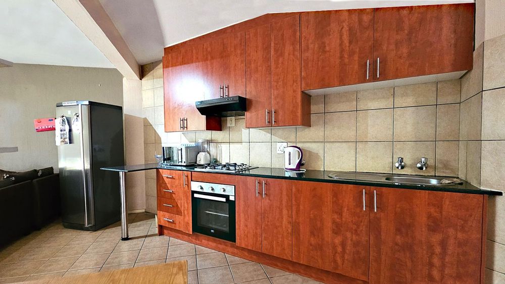 Fully equipped Kitchen with Gas stove and Electric oven.