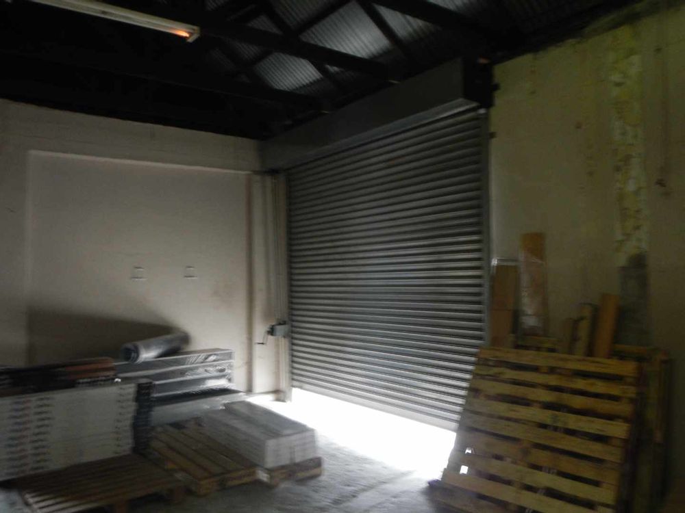 Roller shutter leading to lock up secure yard