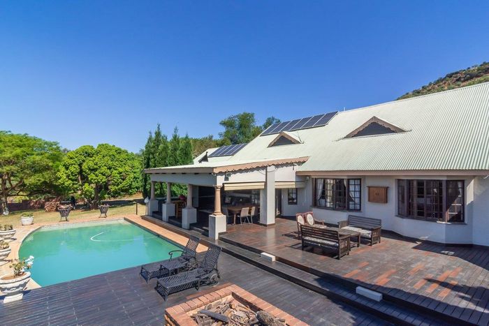 For Sale: Spacious Poortview house with pool, entertainment areas, and self-sustaining features.