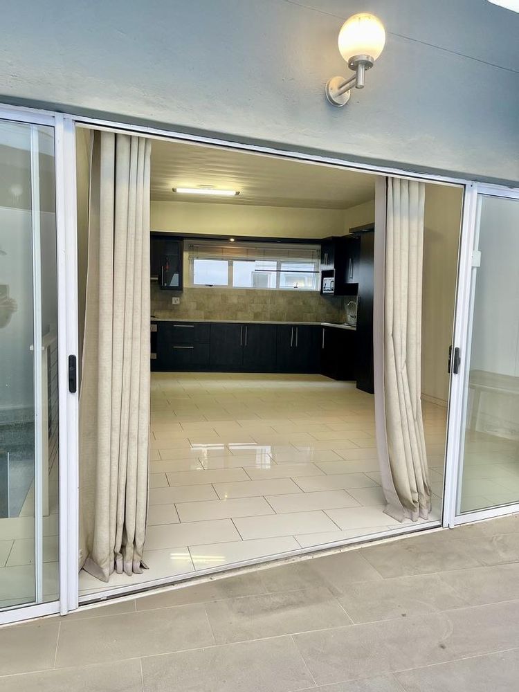 Sliding doors leading to kitchen