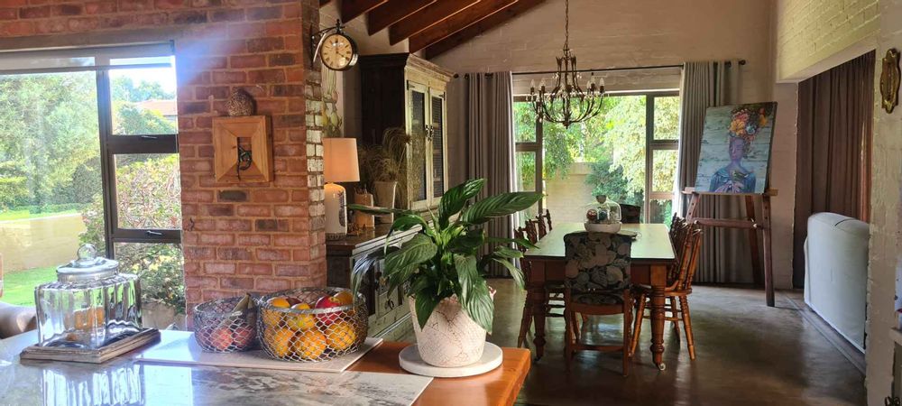 Large dining room open plan to the TV room and kitchen