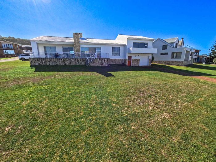For Sale: House in Jongensfontein with sea views, beach access, and rental potential.