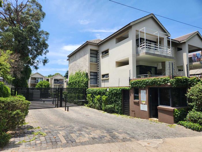 To Rent: Apartment in Saxonwold with 2 en-suite bedrooms, patio, and security.