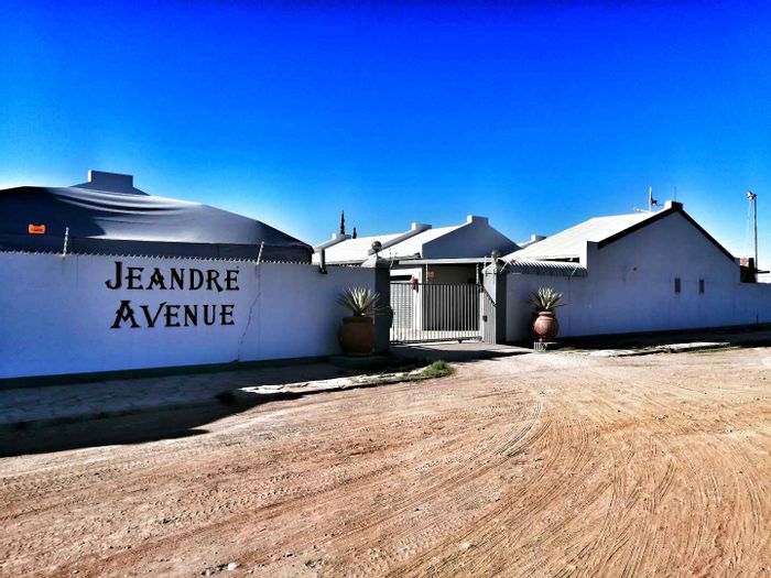 Townhouse For Sale in Mariental Central: 2 Bedrooms, secure complex, rental potential.