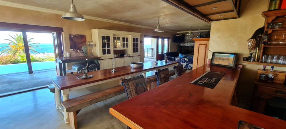 Open plan bar flowing into dining room