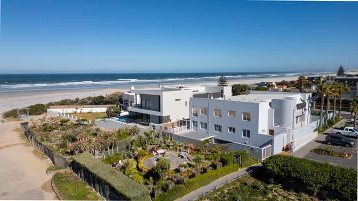 For Sale: 3-Bedroom Apartment in Van Riebeeckstrand with Ocean Views and Beach Access.