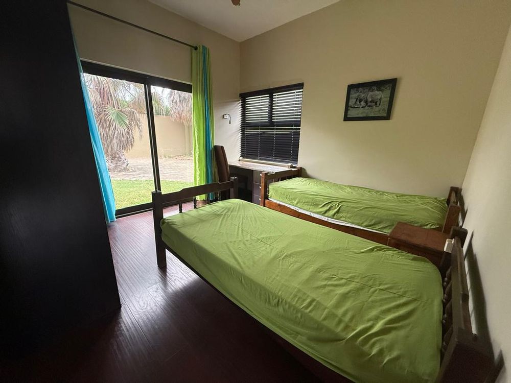 Ground floor, bedroom two, built-in cupboards and shared bathroom