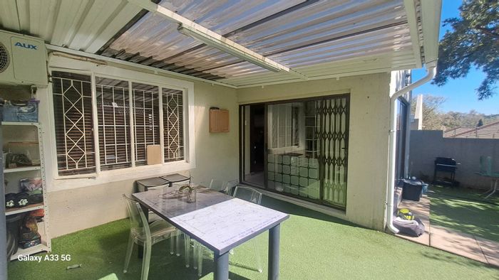 For Sale: 2-Bedroom Townhouse in Buccleuch with Garage, Pet-Friendly Complex, and Pool