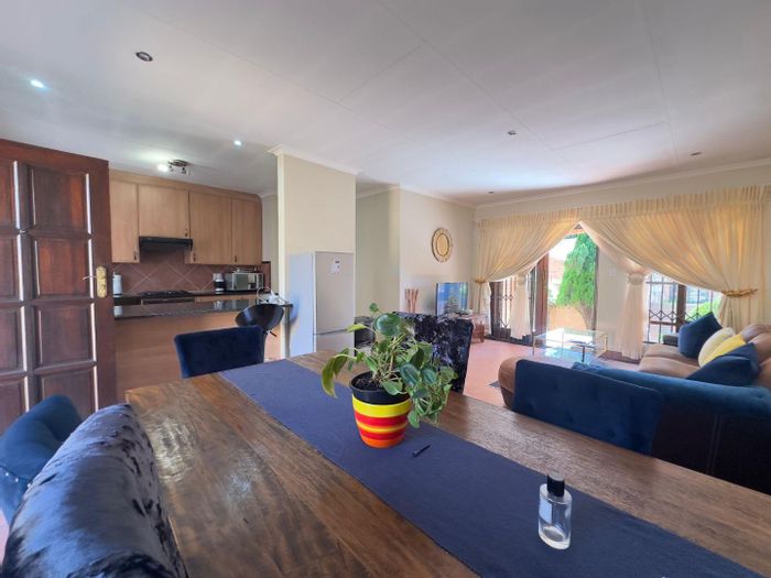 For Sale: Townhouse in Mooikloof Ridge with garden, double garage, and estate amenities.