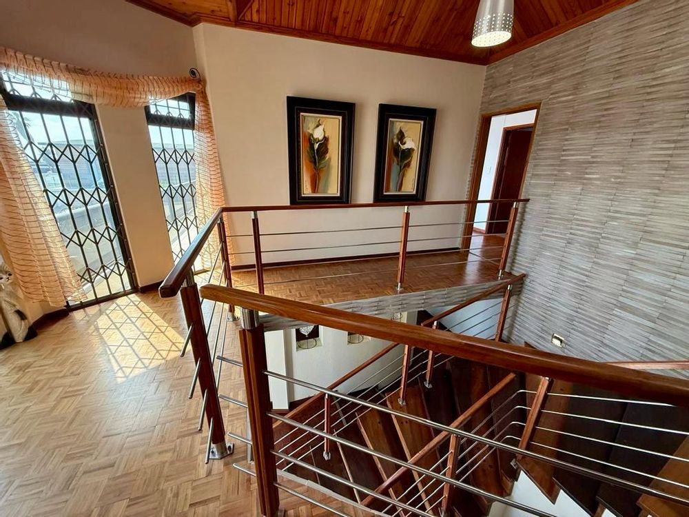 Staircase and main bedroom doorway