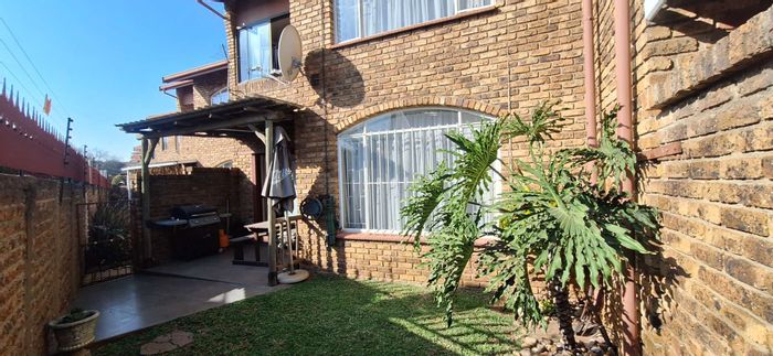 For Sale: Albemarle Townhouse with private garden, garage, and ample parking.