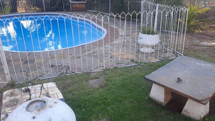 2-Bedroom Townhouse For Sale in Townsview with pool, gardens, and balcony access.