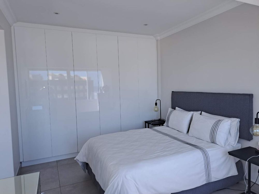 Bedroom area with built in cupboards