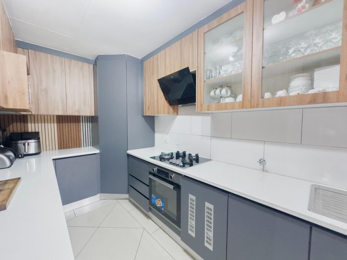 For Sale: Townhouse in Equestria with 24/7 security, park, and rental potential.