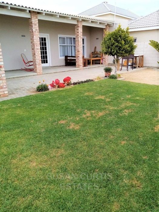 For Sale: House in Swakopmund Ext 15 with 2 beds, patio, and 3 garages.