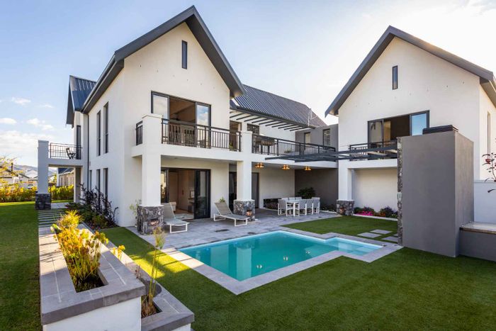 For Sale: House in Val De Vie Estate with lake views, pool, and garages.
