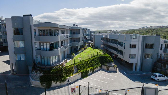 Island View Apartment For Sale: 2 beds, sea views, pet-friendly, secure complex.