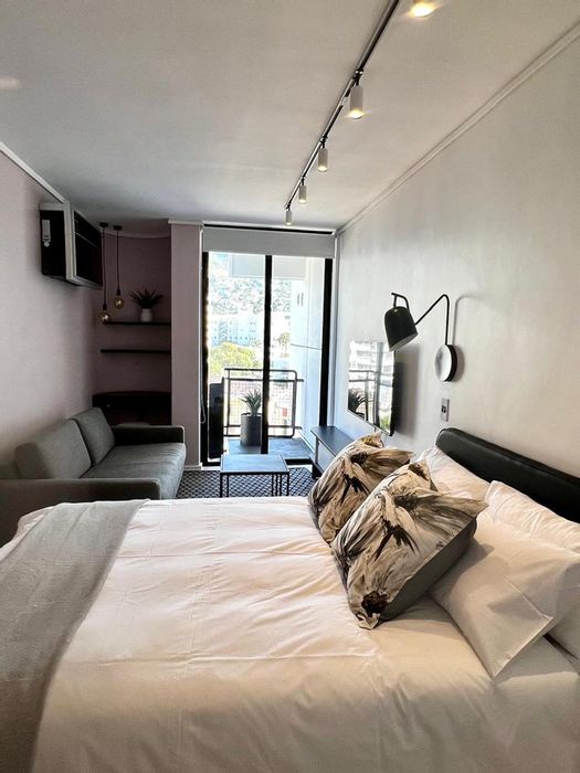 Sea Point Apartment To Rent: Furnished studio, 24-hour security, balcony with views.