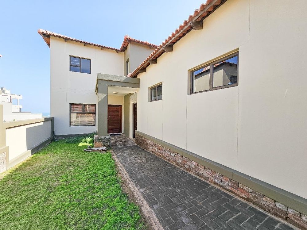 Entrance to the house with own garden area