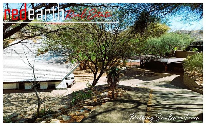 Klein Windhoek House To Rent: 4 bedrooms, pool, garden, secure parking, and storage.