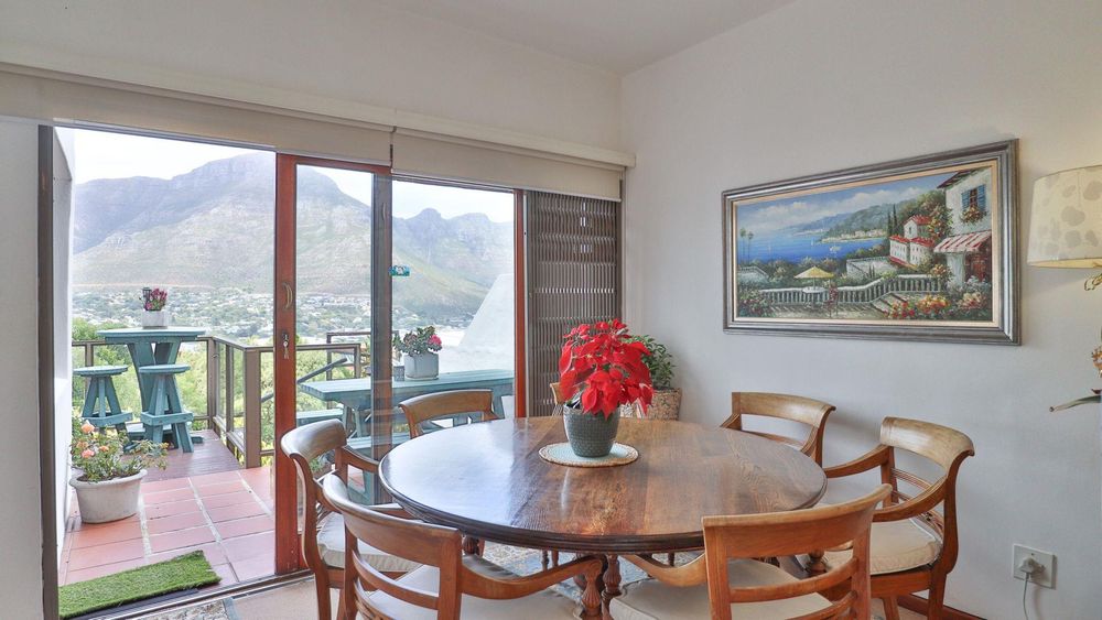 Dining area with mountain and sea view