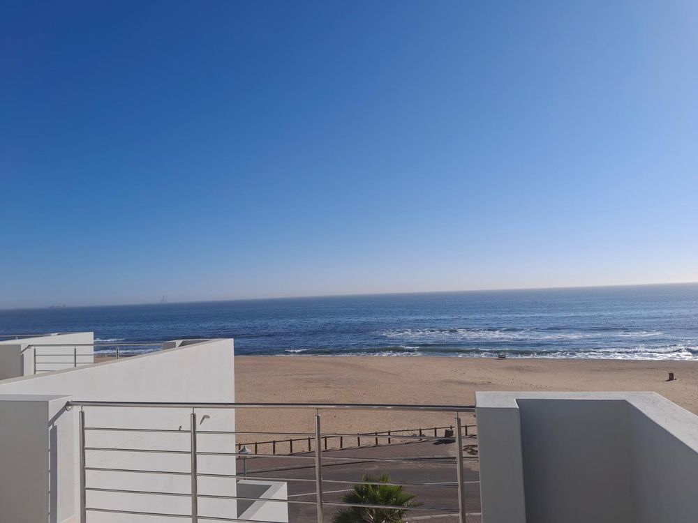 All floors have balconies overlooking the beach.