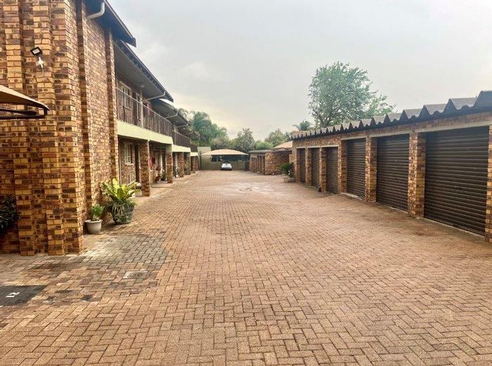 For Sale: Apartment in New Redruth with two bedrooms, garage, and enclosed balcony.