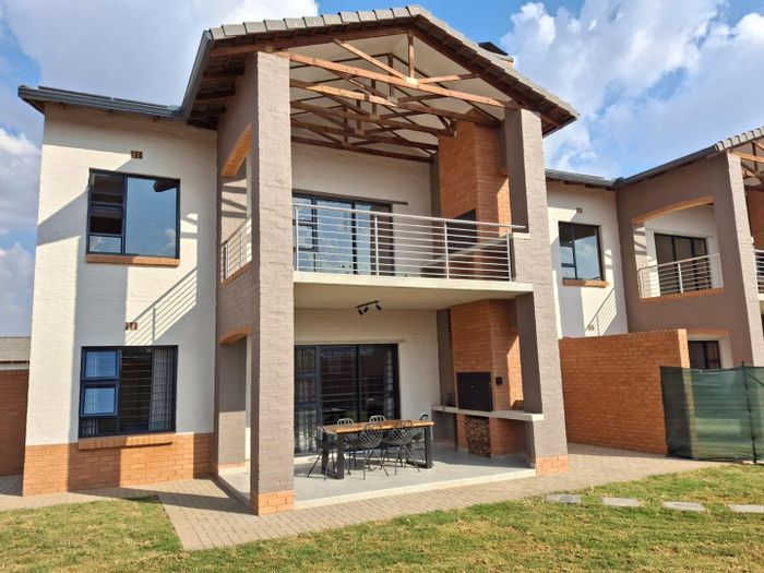 To Rent: 2-Bedroom Townhouse in Rietvalleirand with solar, security, and amenities.