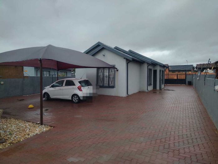 For Sale: House in Soshanguve Ext with 3 bedrooms, security features, and spacious yard.