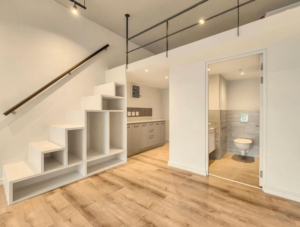 Open plan layout with a mezzanine bedroom