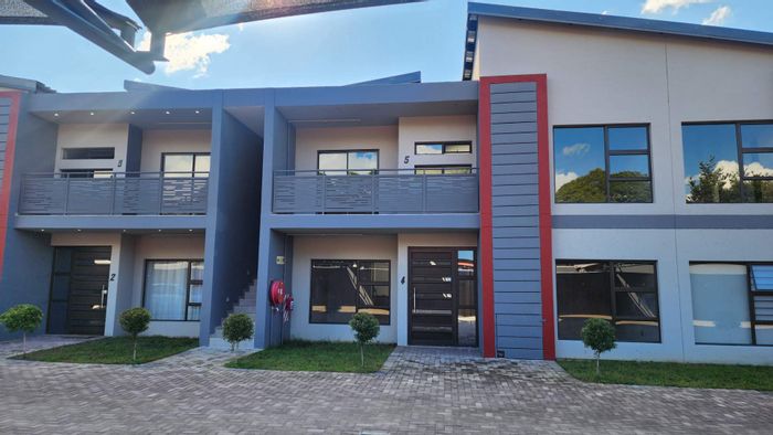 Rustenburg Central Apartment For Sale: 2 beds, near schools and shopping centers.