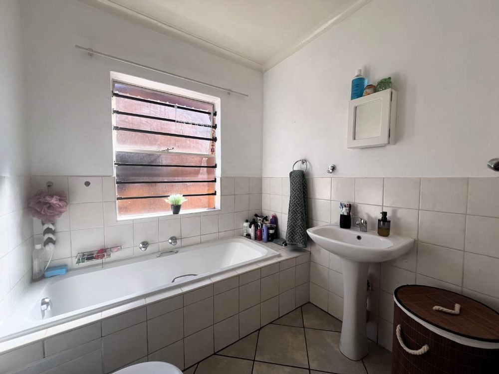 Family bathroom in neutral finishes