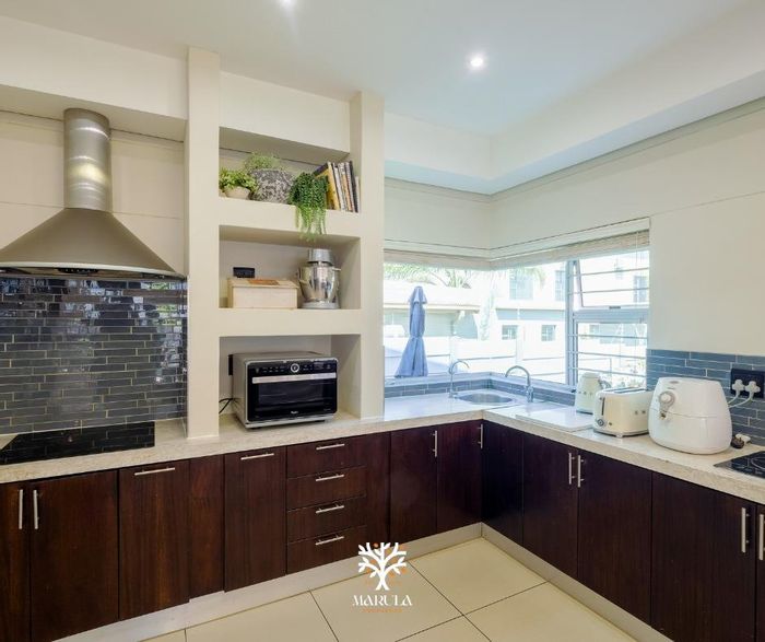 Kleine Kuppe House For Sale: Pool, entertainment areas, security features, family-friendly layout.