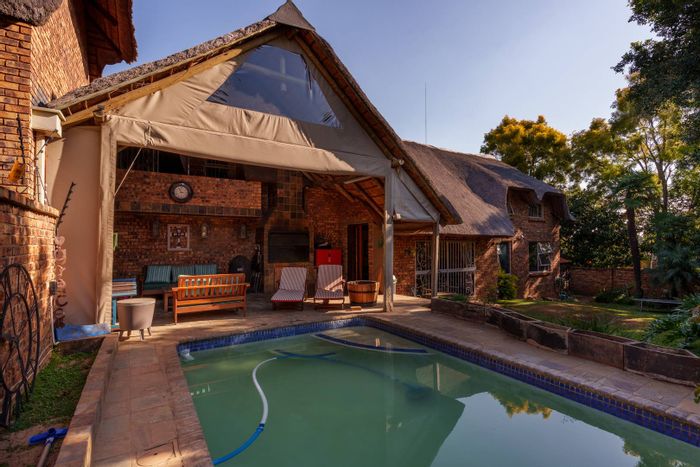 For Sale: Spacious Faerie Glen house with pool, garden, and ample parking.