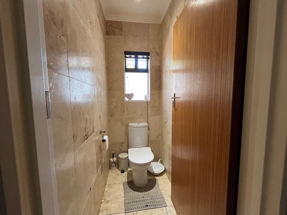 Separate toilet for second bathroom.