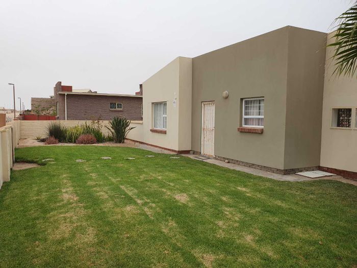 Henties Bay Central House For Sale: 3 bedrooms, courtyard, double garage, security system.