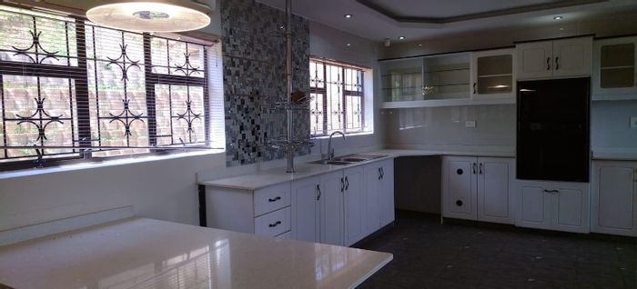 Family-friendly house in La Mercy Central with garden, study, and double garage. To Rent.